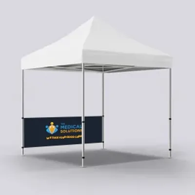 Half Back Wall Single Sided A white canopy tent with a customized blue banner displaying 'MEDICAL SOLUTION' and a logo, designed for a trade show setup.
