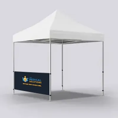 Half Left Wall Both Sided A white trade show tent with a custom-branded front valance bearing the logo and text 'MEDICAL SOLUTIONS - WHERE WE FOCUS.'