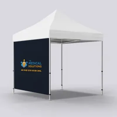 Full Left Wall Single Sided A canopy tent with a white top and a branded back wall reading 'MEDICAL SOLUTIONS - We care for your care.' It’s set against a plain, light background.