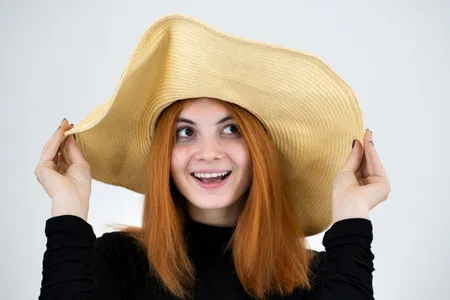 How to Wear a Hat With Long Hair - Woman's Style