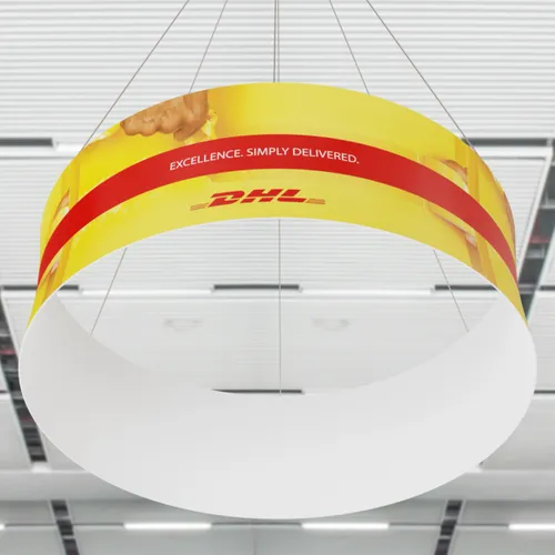 A curved hanging banner displays DHL branding with the slogan 'EXCELLENCE. SIMPLY DELIVERED.' suspended in an indoor setting, likely a trade show.